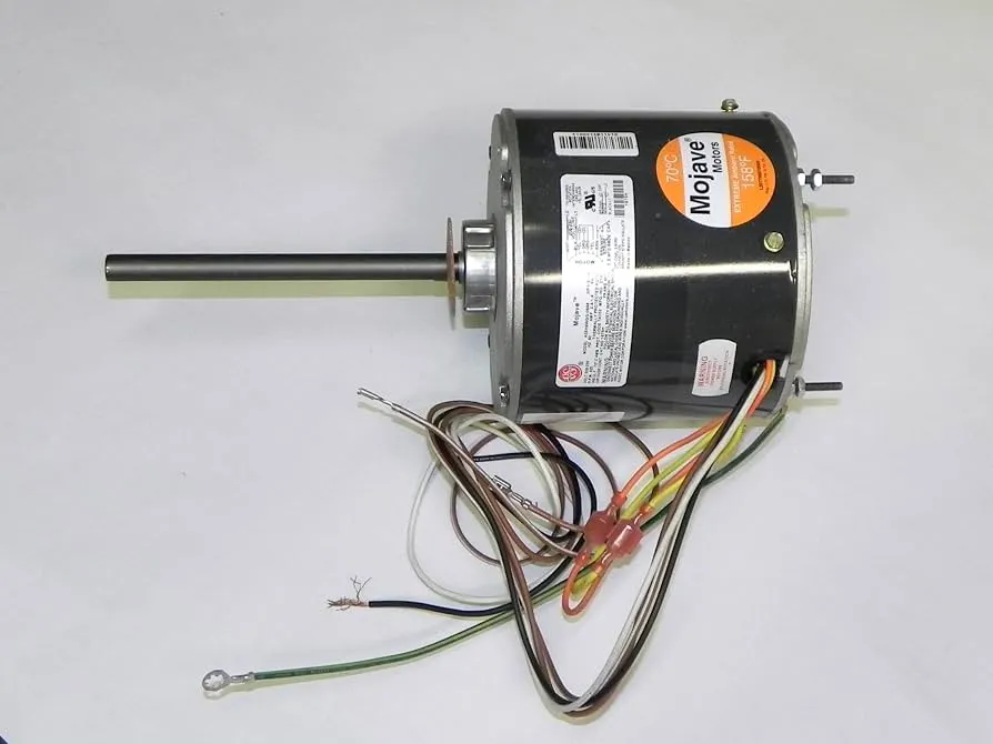 Condenser fan motor replacement on an outdoor air conditioning unit in Fresno, California